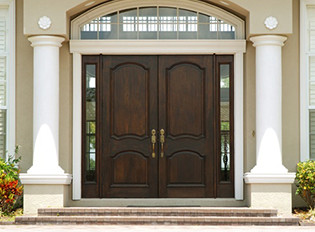 Dark coated wood double door entryway