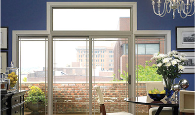 Rectangular glass doors and windows to patio